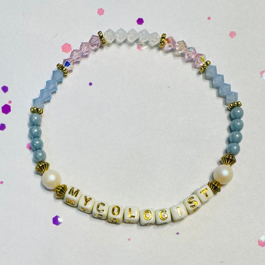Mycologist (cream/gold letters)